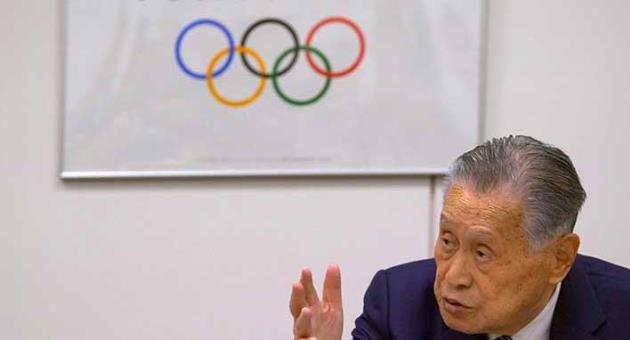 Tokyo 2020 Olympics President Yoshiro Mori speaks during an executive board meeting in Tokyo, Tuesday, April 10, 2018. Tokyo Olympic organizers said the Olympic flame will be put on display at various locations in the Tohoku region to help underscore Japan's recovery from the disaster that took more than 18,000 lives and triggered meltdowns at the Fukushima nuclear power plant. (AP Photo/Shizuo Kambayashi)