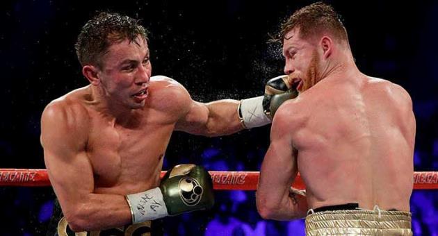 In this Sept. 17, 2017 file photo shows Gennady Golovkin, left, connects with a left to Canelo Alvarez during a middleweight title fight in Las Vegas. Golovkin is growing frustrated with boxing's sanctioning bodies while he struggles to find a replacement opponent for Canelo Alvarez on May 5. The unbeaten middleweight champion's rematch with Alvarez in Las Vegas fell through after the Mexican star failed a doping test in February and finally withdrew from the bout last week.(AP Photo/John Locher, File)