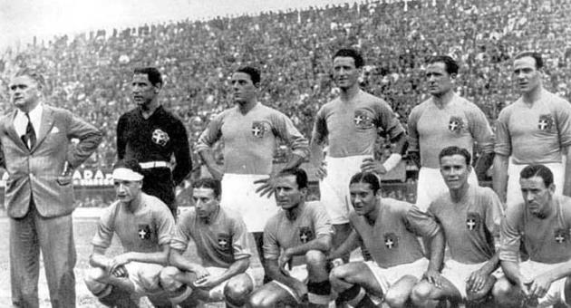 The Italian team is pictured with their coach Vittorio Pozzo before the 1934 FIFA World Cup semi-final against Austria. Milan, Italy, 3rd June, 1934. Photo: FIFA