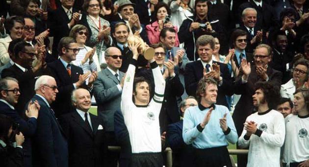 Germany’s captain Franz Beckenbauer lifting the new FIFA?World Cup trophy created by the Italian sculptor Silvio Gazzaniga. The final was played on 7th July 1974.