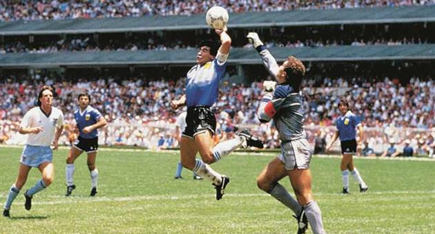 Maradona’s notorious first goal against England... with God’s ‘Helping Hand’.