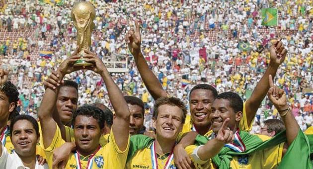 Romario, who was voted best player of the tournament, lifts the FIFA?World Cup after Brazil won the penalty shoot-out against Italy in the final. Photo:?FIFA