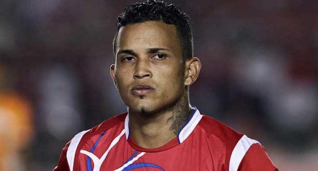 In this Friday, June 7, 2013, file photo, Panama's Amilcar Henriquez stands during the playing of the Mexican national anthem before a World Cup qualifying soccer match against Mexico in Panama City. Police in Panama said Henriquez was shot dead while leaving his home on Saturday, April 15, 2017. Coming from a country best known for baseball players, they will be overjoyed during their first trip to the World Cup. But they will also have one name on their minds: Amilcar Henriquez. The 33-year-old midfielder had been playing for Panama in World Cup qualifying until he was shot to death. (AP Photo/Arnulfo Franco, File)