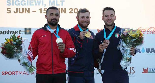 All smiles for the three podium winners - (L-R) Azmy Mehelba from Egypt who won silver, gold for USA's Vincent Hancock and bronze for Italy's Gabriele Rossetti. Photo: Domenic Aquilina