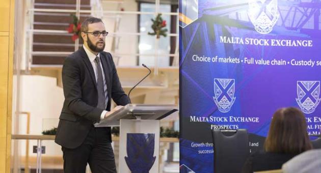 Jordan Portelli, Investment Manager at Calamatta Cuschieri, delivering his presentation at the MSE Educational Seminar
