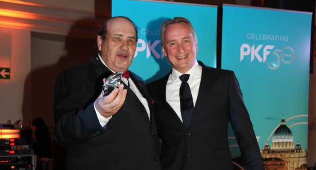 George Mangion, Senior Partner of PKF Malta receiving the Diamond Award from Sebastian Wohldorf, Chairman of PKF International during the recent Global Gathering Meeting held in Rome.