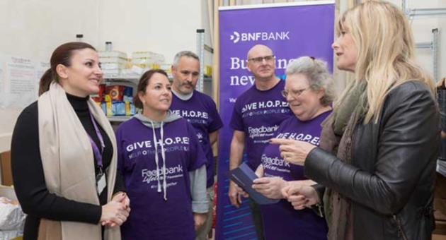Alison Grech, Head of Human Resources at BNF Bank together with Jane Mizzi, Board Member, Diana Joyce Nye, Acting Chairperson at Foodbank Lifeline Foundation with some of the Foundation’s volunteers. 