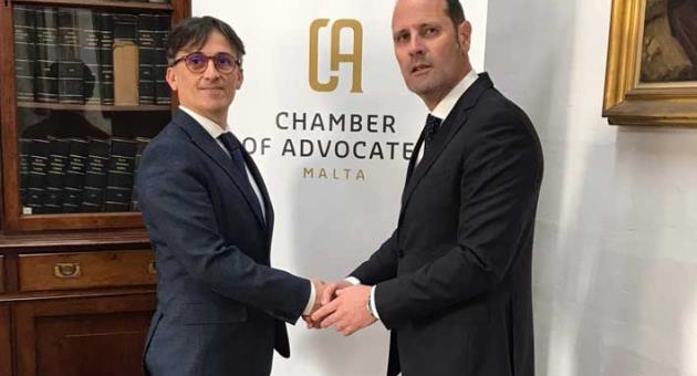 Dr Malcolm Mallia from LEXCO with Dr Stefan Camilleri, Secretary General of the Chamber of Advocates following the agreement signing.