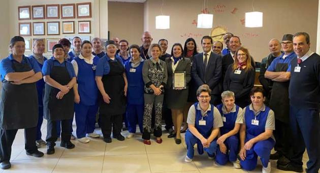 Amanda Tonna, facility manager at the Mellieha home, with CareMalta CEO Natalie Briffa Farrugia and James Sciriha, Director of Finance, and all the team members who worked hard to obtain the gold award.