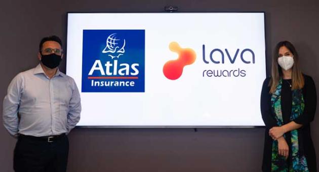 Robert Micallef, Chief Commercial Officer at Atlas Insurance and Daniela Papagiorcopulo, e-Commerce Manager at Sloane, during the signing of the agreement between Atlas Insurance and Lava Rewards.