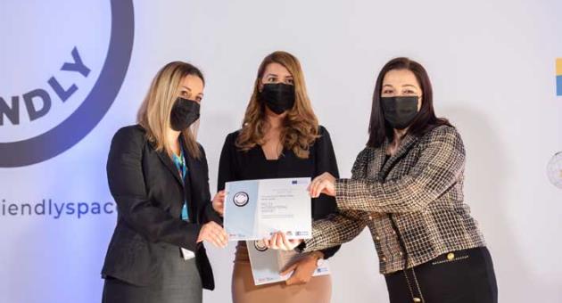 Malta International Airport’s first autism ambassador, Maria Daniela Caruana, receiving the Autism Friendly Spaces certificate on behalf of the company.