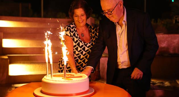 Mr Louis A. Farrugia, Farsons Group Chairman, and Ms Susan Weenink Camilleri, Head of Sales & Marketing, cutting the celebratory cake.