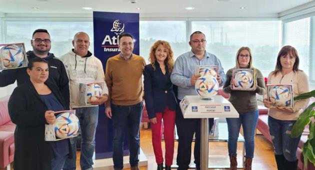 The lucky winners of the Atlas Matchday Moments competition presented with their prizes by Robert Micallef from Atlas Insurance and Ramona Mamo DeGiovanni on behalf of PBS.
