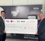 From left: Duncan Agius, ESS and Elektra managing director, presents the sponsorship cheque to Din l-Art Helwa executive president Alex Torpiano.