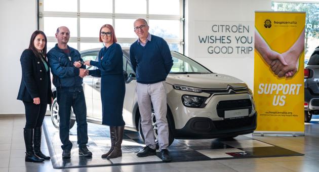(From left) Svetlana Bonanno and fundraising lottery winner Anthony Bonanno being handed the keys of a brand-new Citroën C3 by Hospice Malta CRO Alexia Demicoli and Tonio Fenech, Citroen General Manager at  Michael Attard Ltd 
