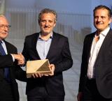 From left: Perit Vincent Cassar, Chairman of the MASP Jury Committee presenting the Rehabilitation & Conservation Award to Mr Michael Farrugia, Deputy Chief Executive (Beverage Business) at Simonds Farsons Cisk plc, with Mr John Bonello Ghio, Head of The Brewhouse. 