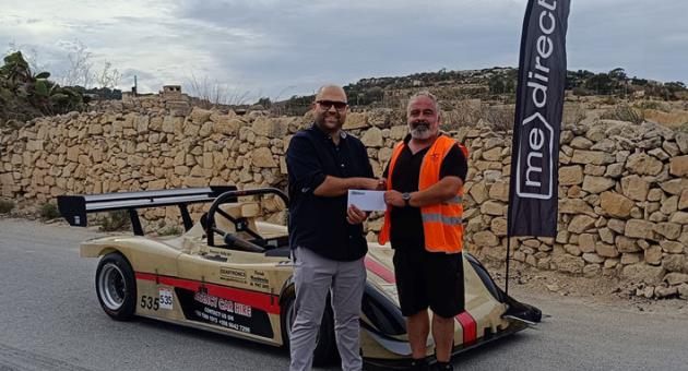 Roderick Bugeja, Senior Wealth Manager at MeDirect Malta (left), together with Jeremy Cassar, Club Secretary of the Island Car Club.