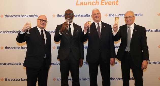 Honourable Stefan Zrinzo Azzopardi, Minister for Lands and the Implementation of the Electoral Programme, joins Jamie Simmonds, Renald Theuma, and Roosevelt Ogbonna in a celebratory toast at Palazzo Parisio in Naxxar, marking the successful launch of The Access Bank Malta Limited.