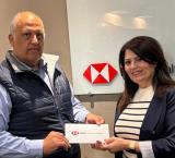 Glenn Bugeja on behalf of the HSBC Malta Foundation and Suzette Muscat, Executive Secretary at Life Network Foundation