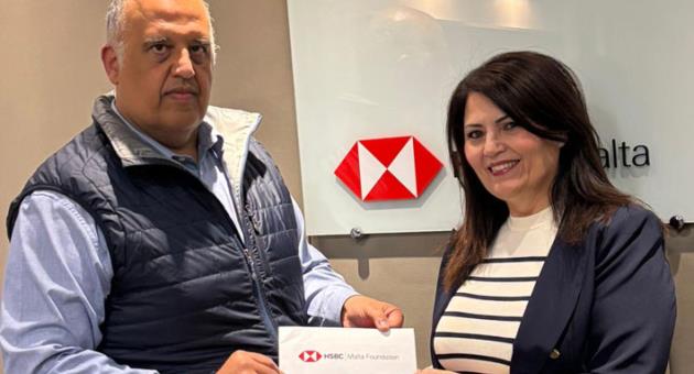 Glenn Bugeja on behalf of the HSBC Malta Foundation and Suzette Muscat, Executive Secretary at Life Network Foundation