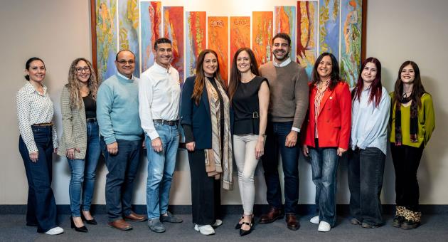 Malta International Airport’s Art Committee, backdropped by a painting by Ebba von Fersen Balzan